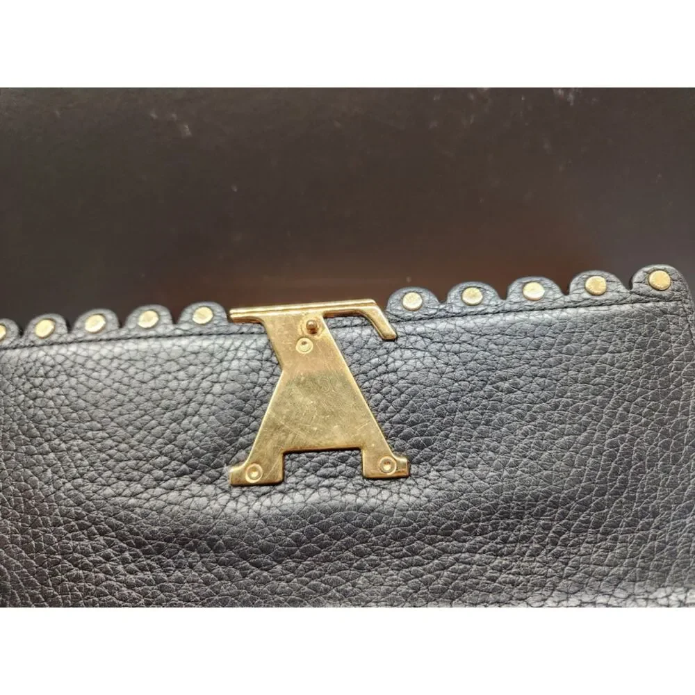 Louis Vuitton Capucines Studded Taurillon Leather Long Wallet Black/Gold LV Logo